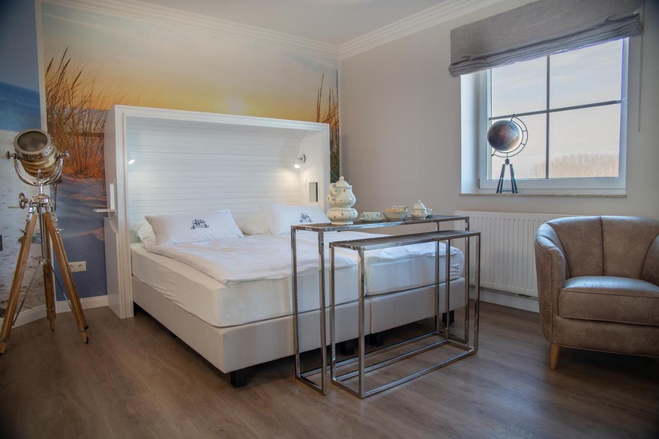 Hotel Duenenlaeufer Carolinensiel Bagian luar foto