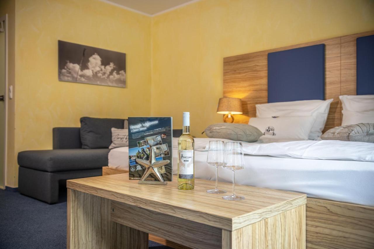Hotel Duenenlaeufer Carolinensiel Bagian luar foto