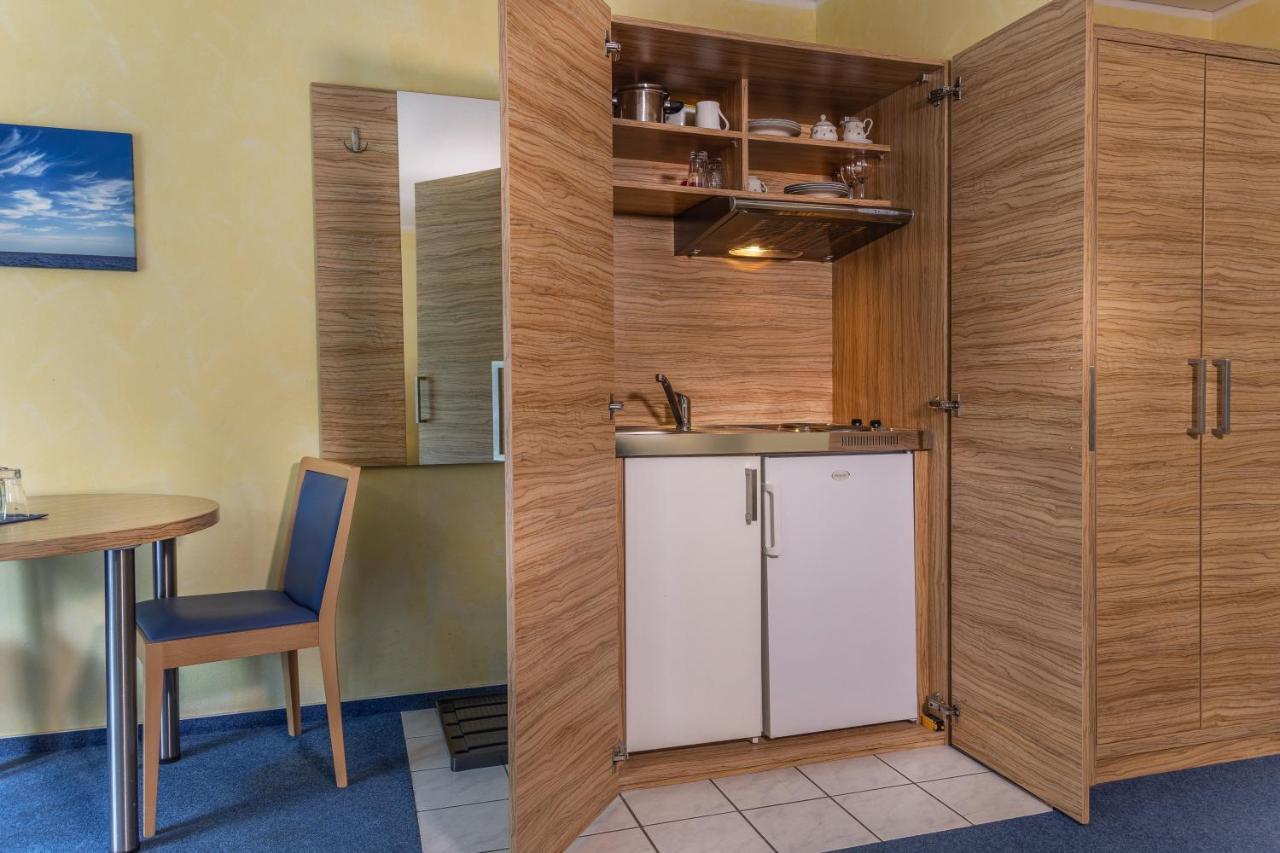 Hotel Duenenlaeufer Carolinensiel Bagian luar foto